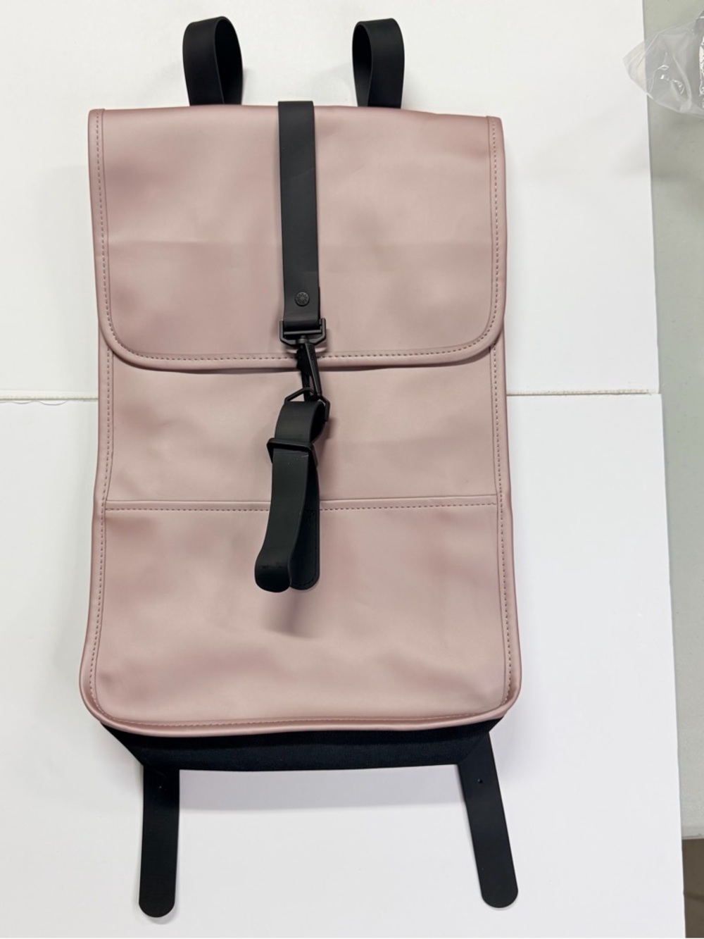 Rains Dusty Pink Roll-Top Backpack with Black Strap